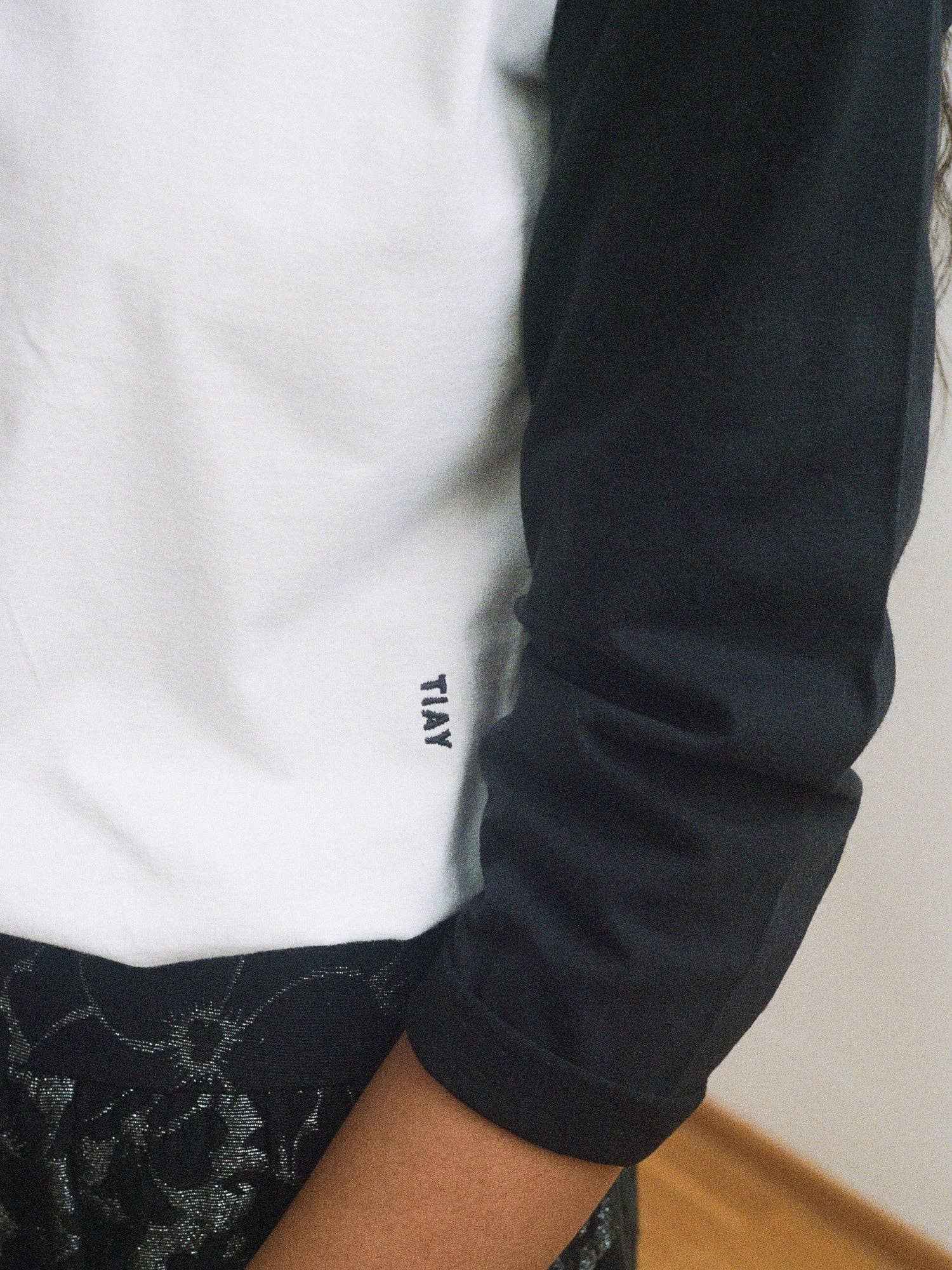 Tomorrow in a Year| Raglan Baseball Tee| Black/White