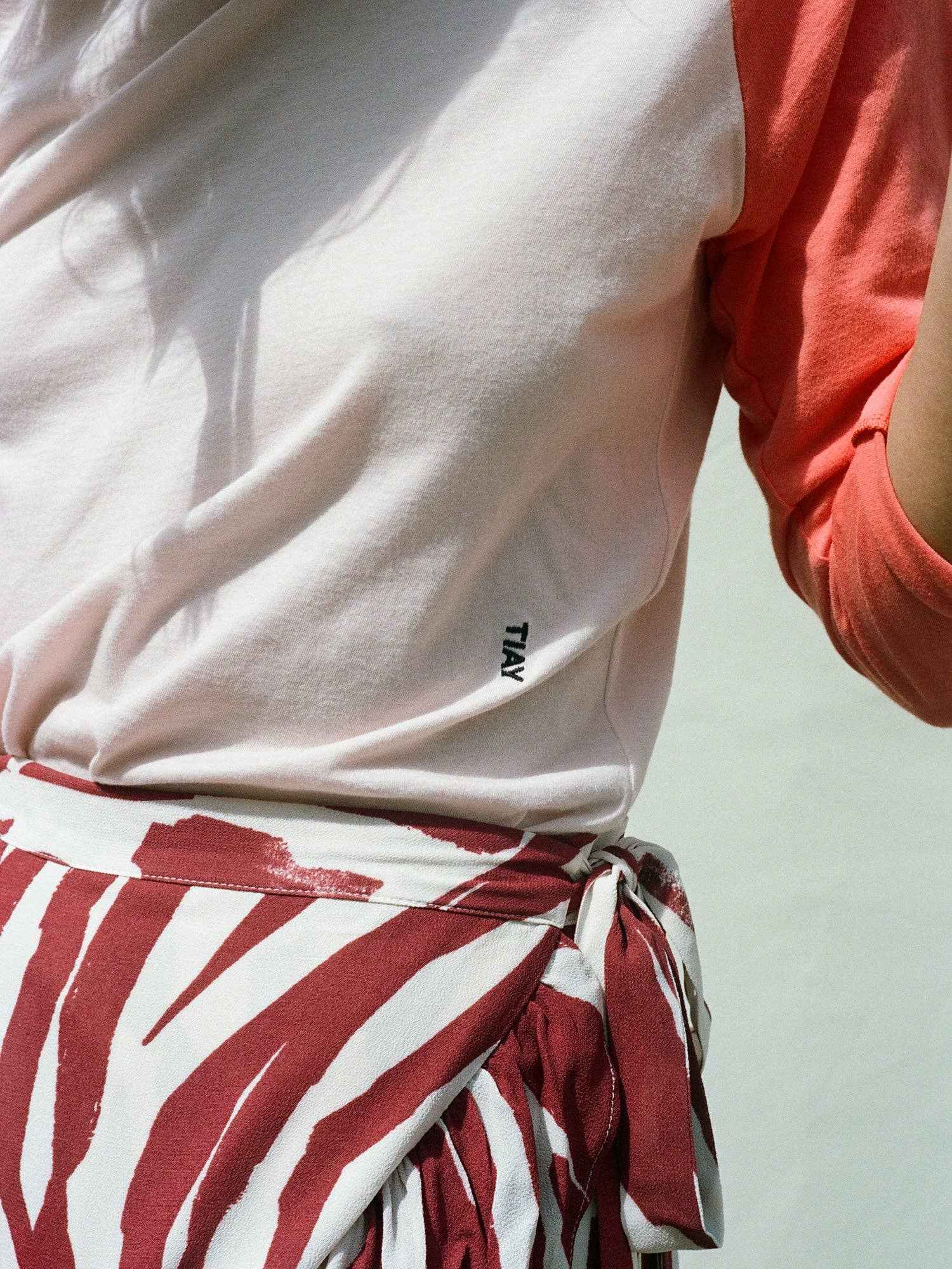 Tomorrow in a Year| Raglan Baseball Tee| Coral/Blush